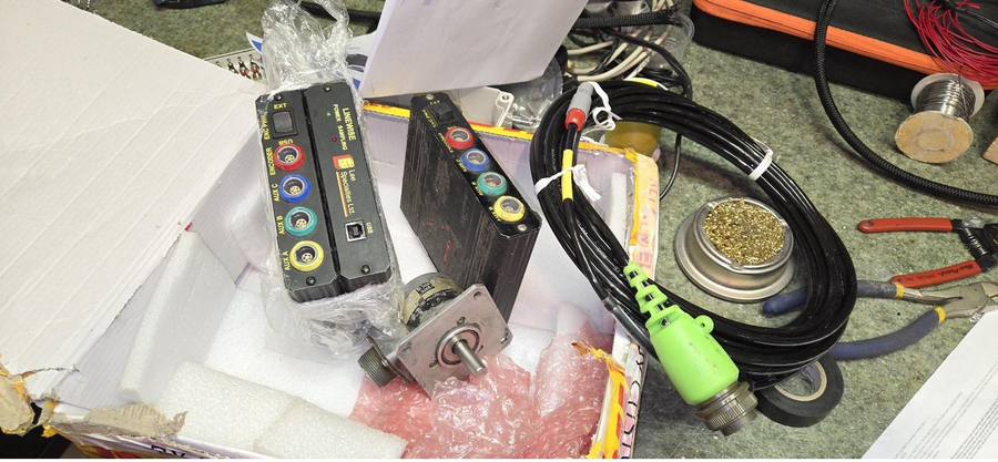 Encoder, power sampling box and cabling laid out on the bench