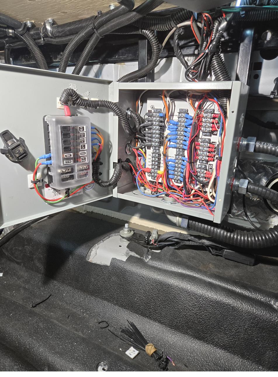 Panel installed in a vehicle bay